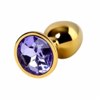 Анальная втулка Toyfa золотая с фиолетовым кристаллом 70 мм.