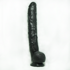 Реалистичный фаллос Дик Рамбон черный на присоске с мошонкой 35,5 см.