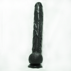Реалистичный фаллос Дик Рамбон черный на присоске с мошонкой 35,5 см.