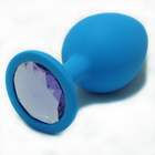 Втулка анальная голубая, цвет кристалла светло - фиолетовый, длина 9,5 см., диаметр 4 см.